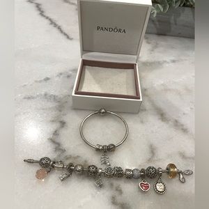 Two authentic Pandora bracelets with charms